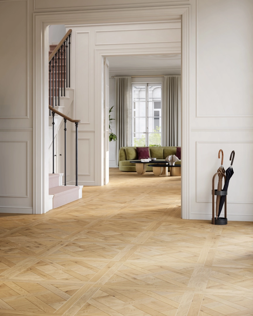 Elegant entryway featuring light oak parquet patterned hardwood flooring.